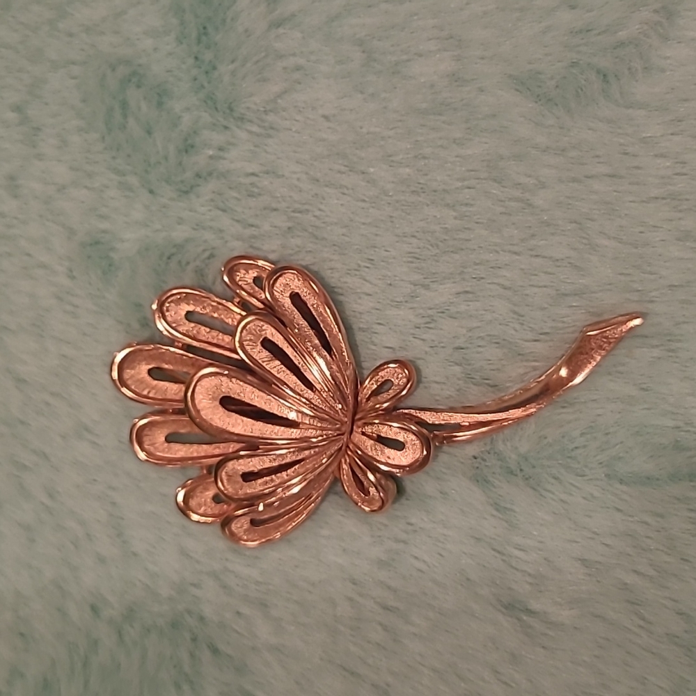 Gold toned Trifari flower brooch